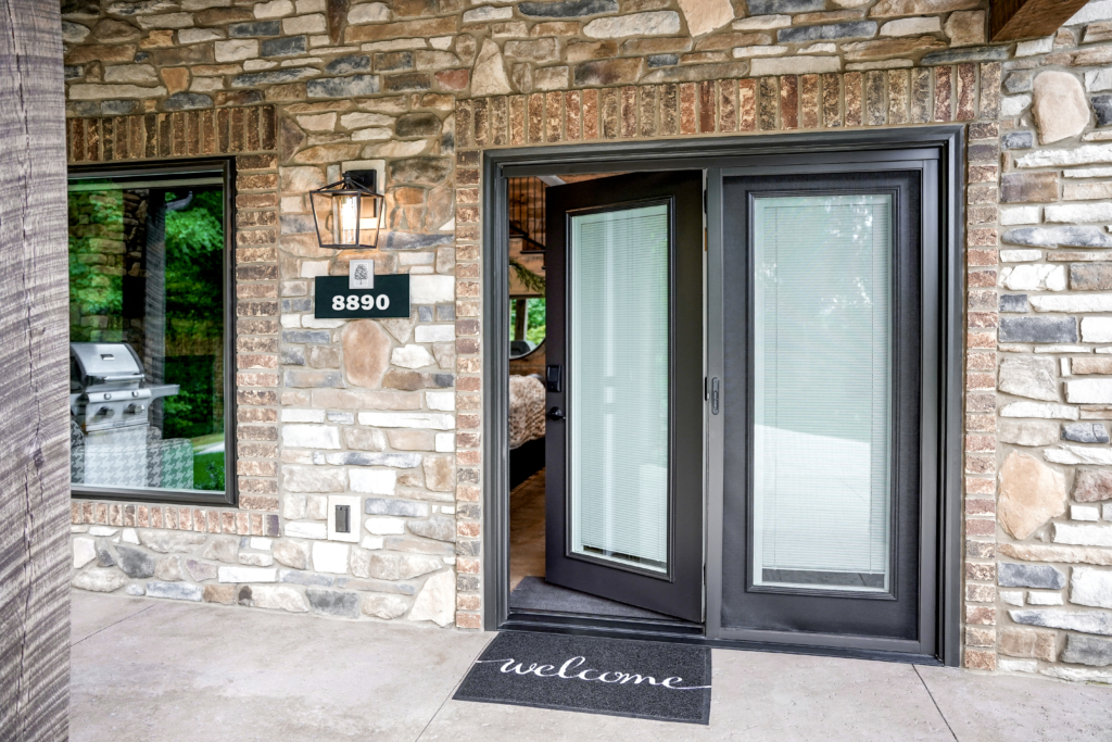 Utah Valley Window and Door Hinged patio door with internal blinds